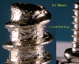 A 2 x 1 macro image of a screw using a  Loawa 100mm macro lens