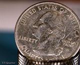 a 1:1 macro of a coin using a  Loawa 100mm macro lens